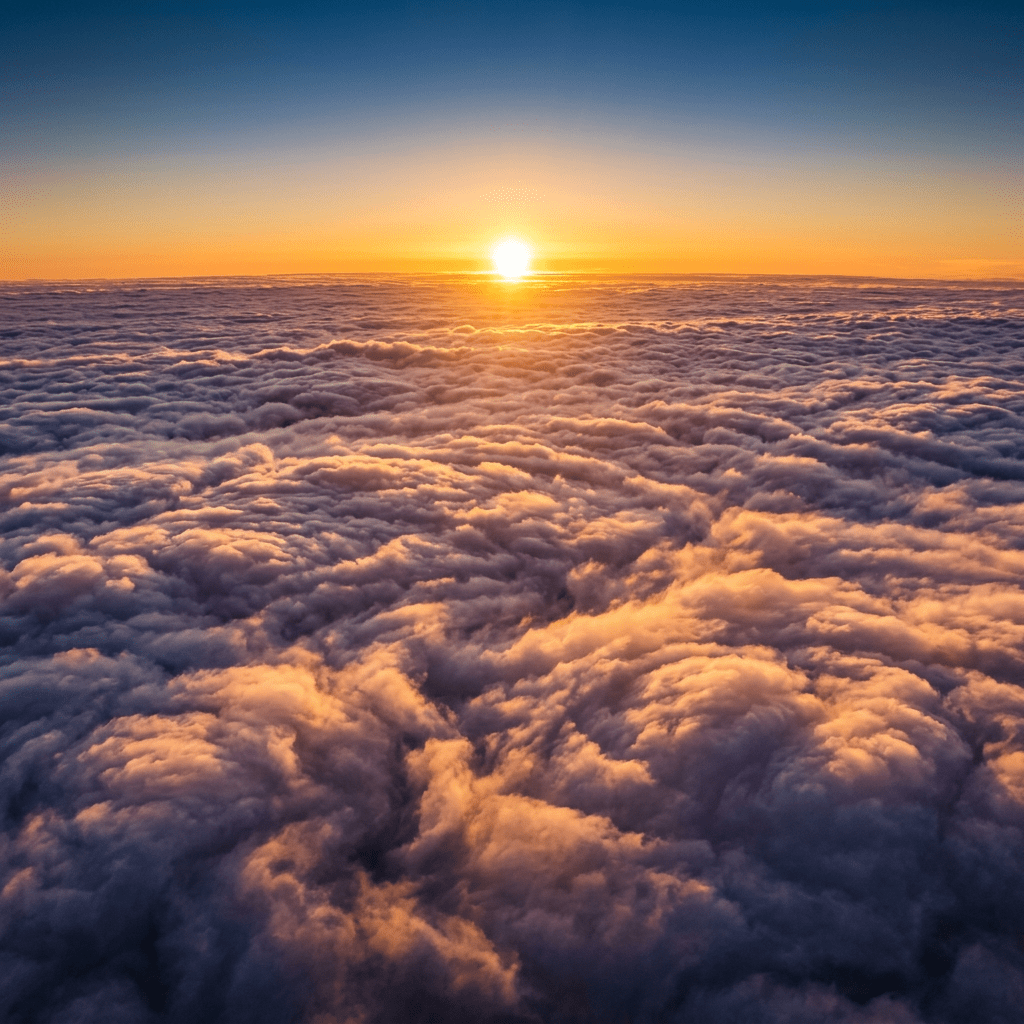 Sunrise above a vast blanket of clouds